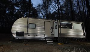 aluminum siding on an rv camper at night time